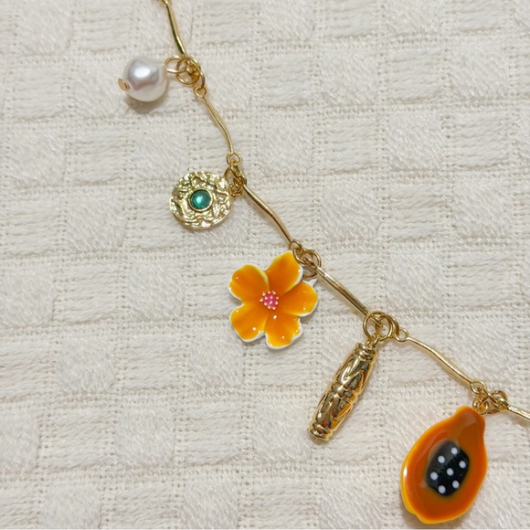 NEW Gold Tone Charm Necklace with Sun Medallion, Pearl & Turquoise Blue Accents - Picture 3 of 9